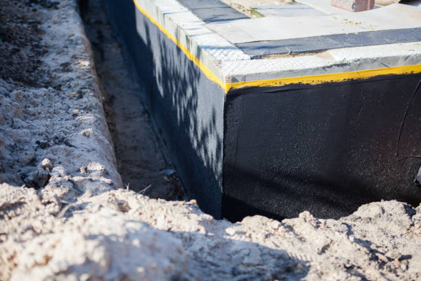 Professional Emergency Waterproofing technician working in Geneseo, IL